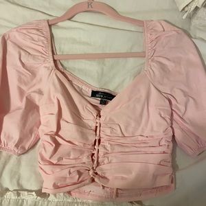 pink puff sleeve lace up crop top